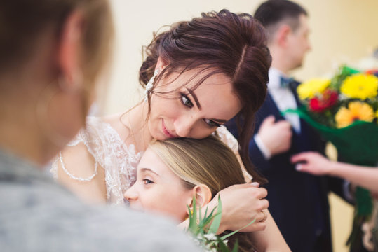 Girl Hugging Mom Touching Photo Emotions