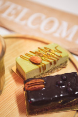 coffee and desserts are on wooden station...