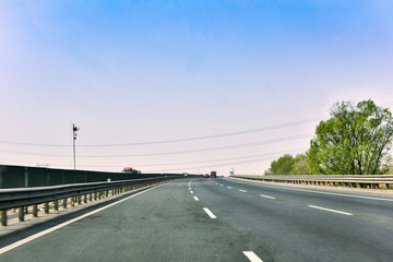 Fototapeta premium Highway Landscape Photographed on Driving Vehicles