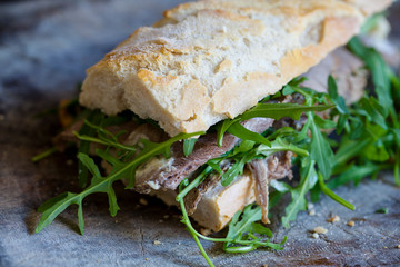 Roast beef, rocket and horseradish sandwich