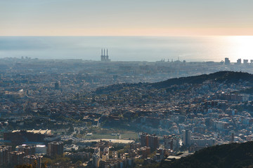 barcelona and sea in light and smoke
