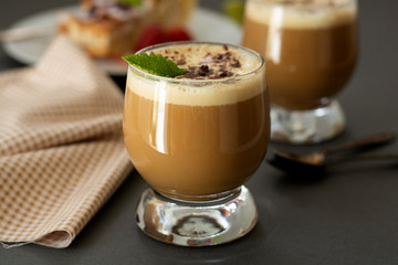 Coffee cold drink with vanilla ice cream and espresso. Deliciouse summer refreshing drink in glass.