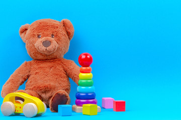 Baby kid toys collection on blue background
