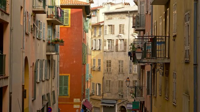 Nice, France. Steadicam shot of color houses in old town of Nice, France. 4K