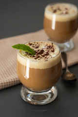 Coffee drink - cold drink with vanilla ice cream and espresso. Deliciouse summer refreshing drink in glass.