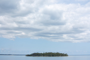 A lonely island and a vast sky in the tropical Tonga