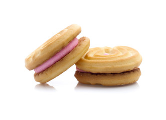 sandwich cookies with strawberry cream on white background