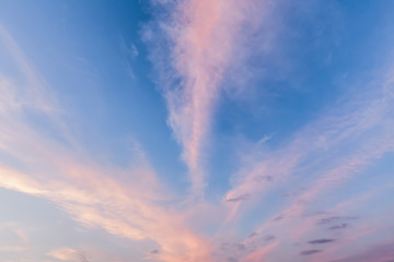 Pink cloud lines and blue skies