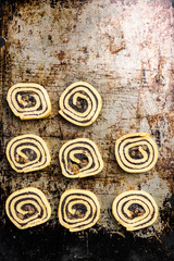Cinnamon rolls swirl ready on baking tray