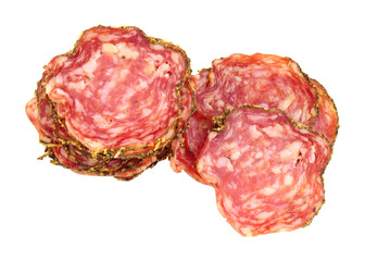 Saucisson Sec French seasoned pork salami meat slices isolated on a white background