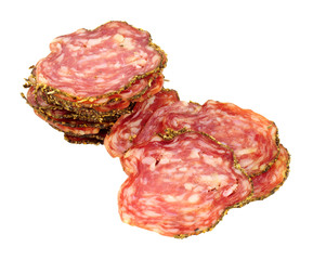 Saucisson Sec French seasoned pork salami meat slices isolated on a white background