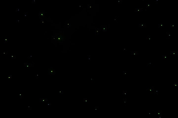 Star-like firework in the night sky with abstract background.