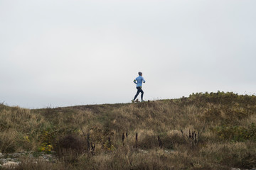 Obraz premium Joggen in der Düne