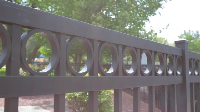 Close up rod iron gate summer