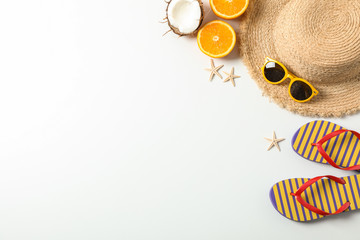 Flat lay composition with summer vacation accessories on white background,top view and space for text. Happy holidays