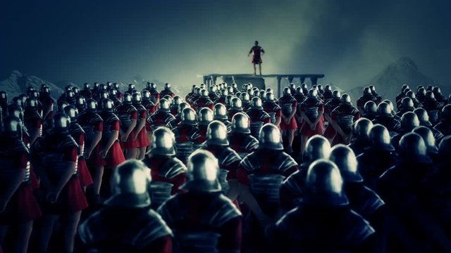 Roman Centurion Gives a Speech in Front of a Legion Under Rain