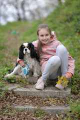 Fototapeta premium Happy girl with a dog 
