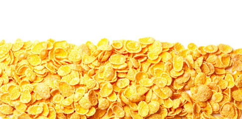Cornflakes dry breakfast. Yellow flakes heap with frame from below isolated on white background