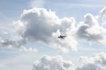 Fototapeta na wymiar silhouette of airplane in the sky