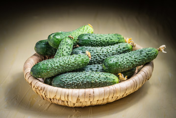 Fresh cucumbers in a basket