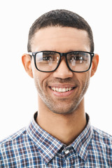 Close up of a happy young man wearing plaid t-shirt