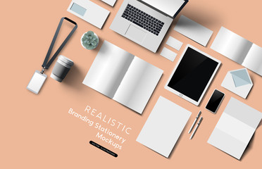 Realistic top down view of office desk stationery and objects. Vector mockup illustration.