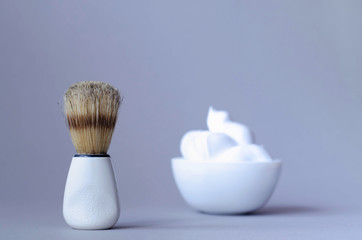 Men's accessories for shaving on a gray background.