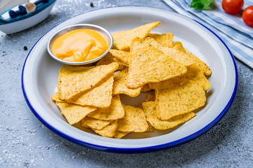nachos chips with cheese sauce