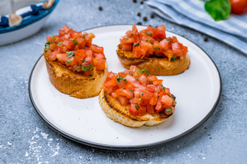 bruschetta with tomatoes on plate