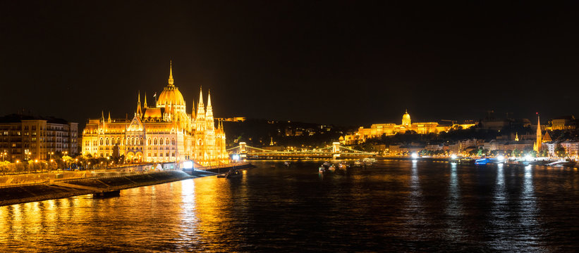 Budapest Parliament at night / Amazing night view with Danube river, Parliament, Castle in Budapest, Hungary