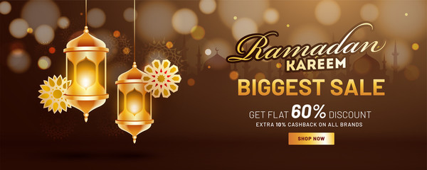 Biggest Sale header or banner design with hanging illuminated lanterns and 60% discount offer for Ramadan Kareem.