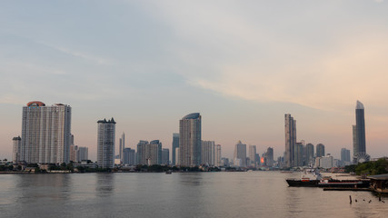 Fototapeta na wymiar Panoramic view building of city with Chao phraya river Bangkok, Thailand. Cityscape concept