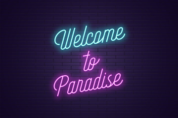 Fototapeta na wymiar Neon lettering of Welcome to Paradise. Glowing text