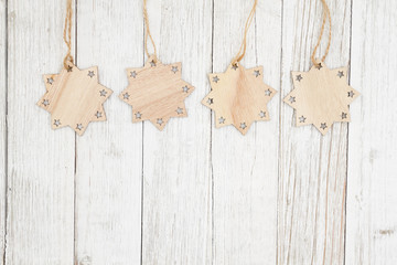 Wood stars on weathered whitewash textured wood background