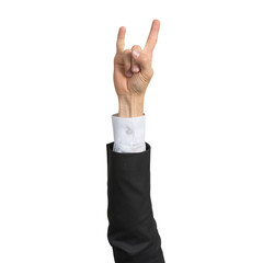 Businessman hand in suit showing rock gesture