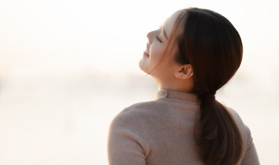 Asian woman she felt relaxed in the evening.