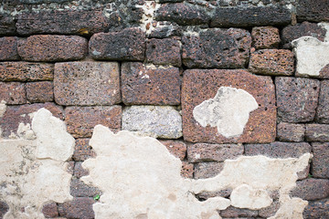 Abstract patterns and surfaces of old brick walls that were brok