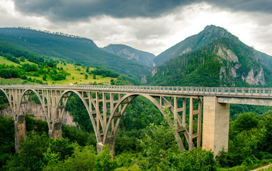 Beautiful Djurdjevica Bridge over River Tara Canyon. Durmitor National Park in Montenegro, Balkans, Europe