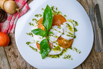 Caprese salad with mozzarella and tomato
