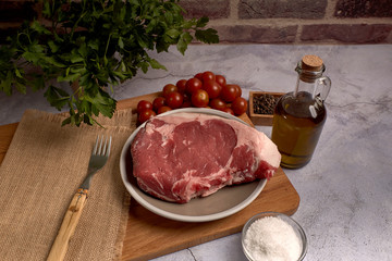 red veal chop on a plate