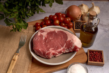 red veal chop on a plate