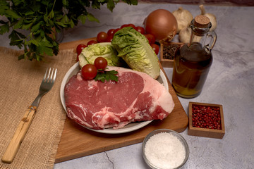 red veal chop on a plate