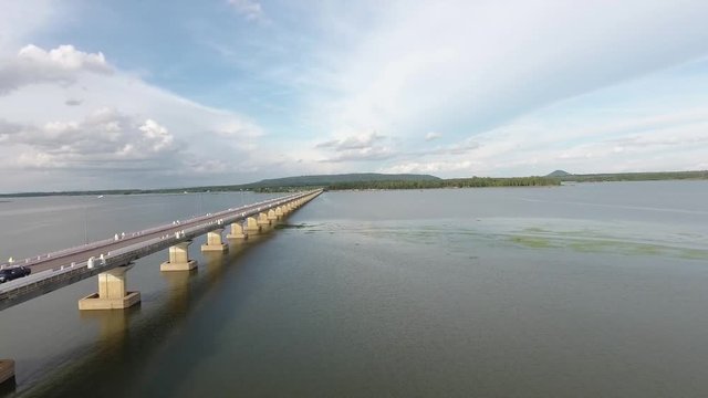 Aerial views from above Thep Sada Bridge the Deja Vu Bridge, 2-lane reinforced concrete bridge across Lam Pao Dam at Kalasin,Thailand