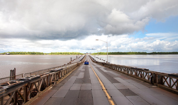 View of the pontoon bridge Demerara Harbour Bridge in Guyana. World tourism and recreation.