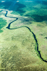 Bird's-eye view of the river and jungle, taken from the plane, South America.