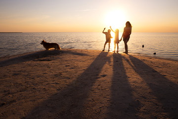 mother and daughters  at the Sea of Azov