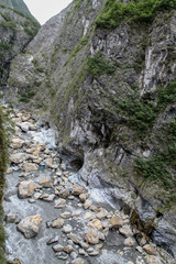 Fototapeta na wymiar Dark river in taroko national park after rain storm in taiwan
