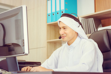 Happiness and smiling Young Arab middle eastern business man with headphones, Professional operator service concept