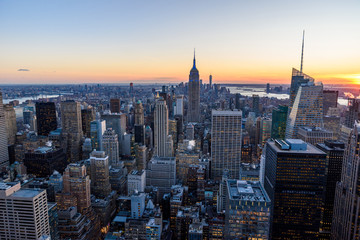 Panorama view of Midtown Manhattan skyline with the Empire State Building from the Rockefeller Center Observation Deck. Top of the Rock - New York City, USA