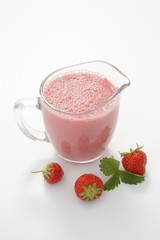 Strawberry cocktail and fresh strawberries